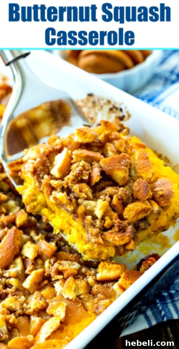 A close-up shot of the finished Butternut Squash Casserole with its perfectly golden-brown vanilla wafer crumb topping.