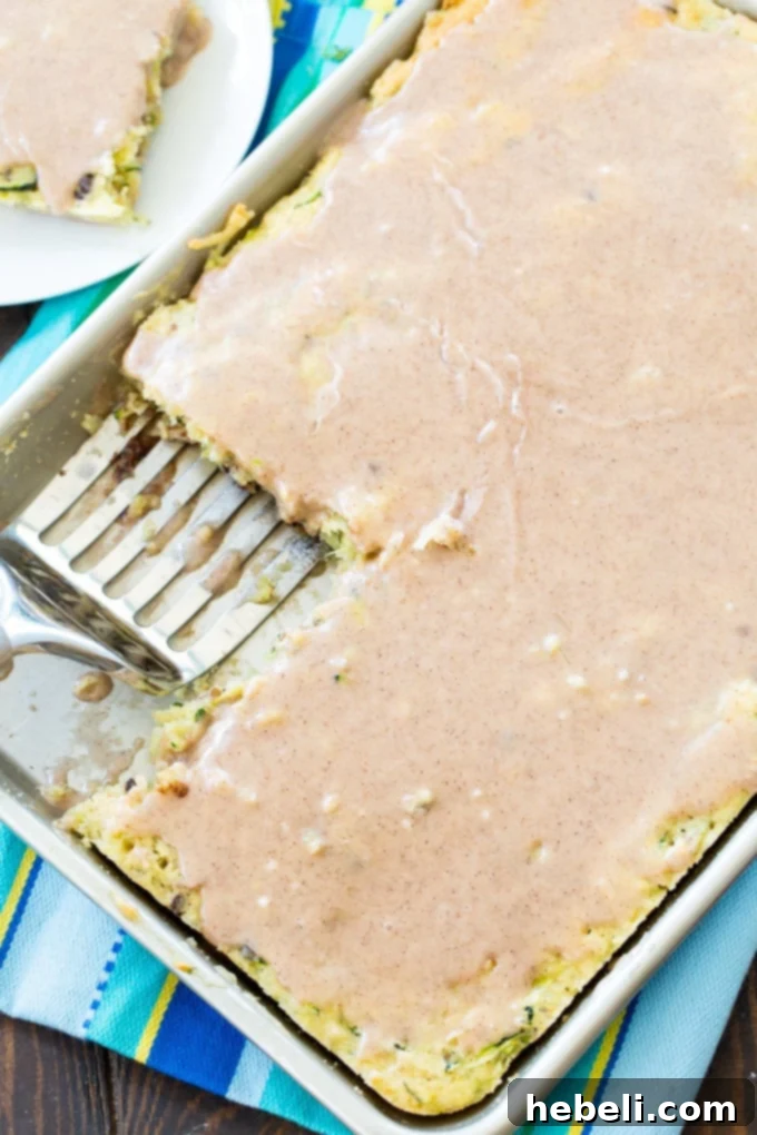 Golden Zucchini Pecan Coconut Squares 2 Delicious Zucchini Bars with Pecans and Coconut, topped with cinnamon glaze