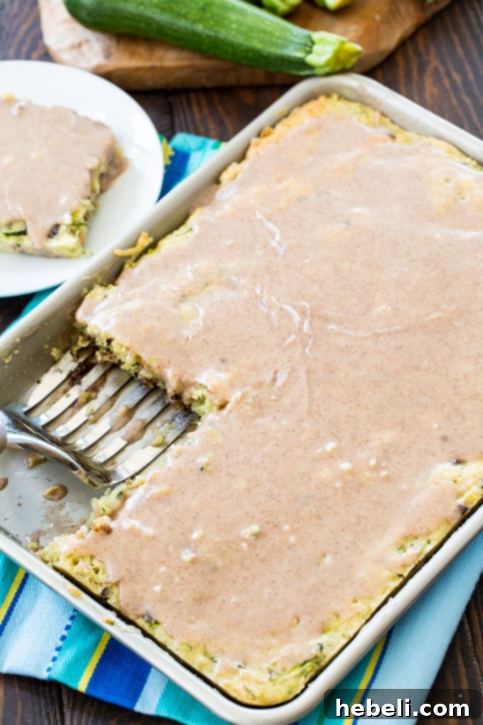 Golden Zucchini Pecan Coconut Squares 3 Close-up of a Zucchini Bar slice, showing moist texture, pecans, and coconut