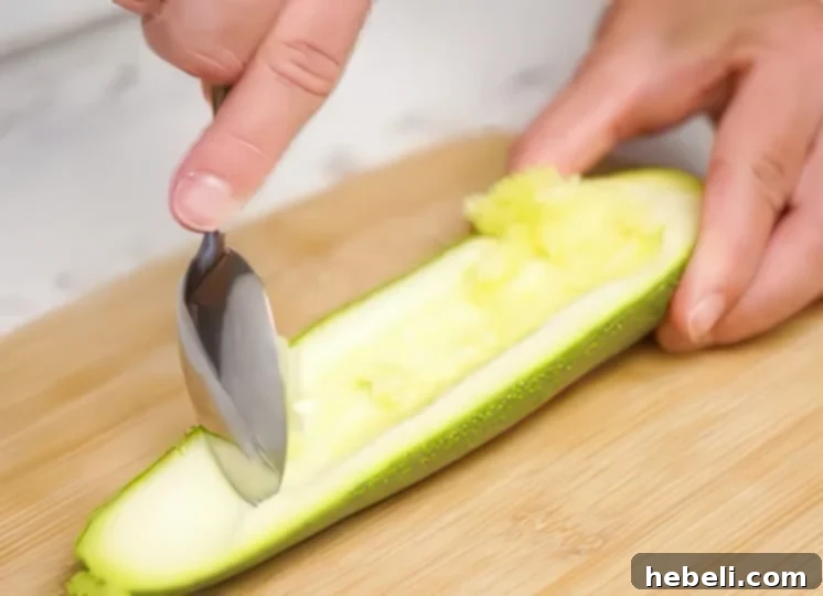 Removing seeds from zucchini.