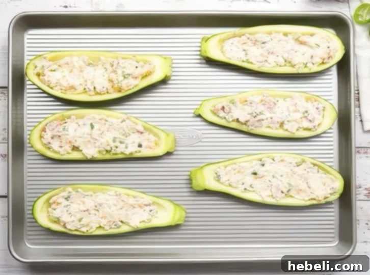 Zucchini stuffed with filling.