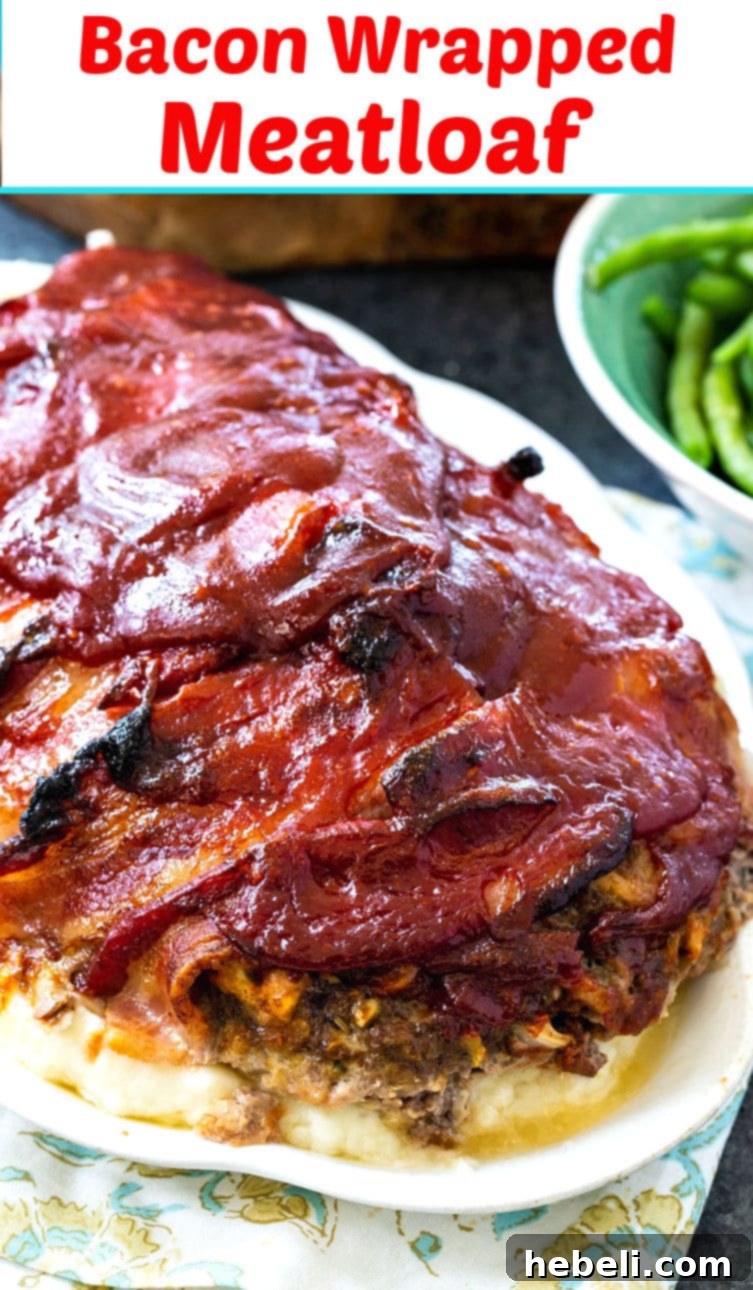 Bacon Enrobed Meatloaf 6 Bacon Wrapped Meatloaf on a serving board with a knife and fork, ready to be enjoyed.
