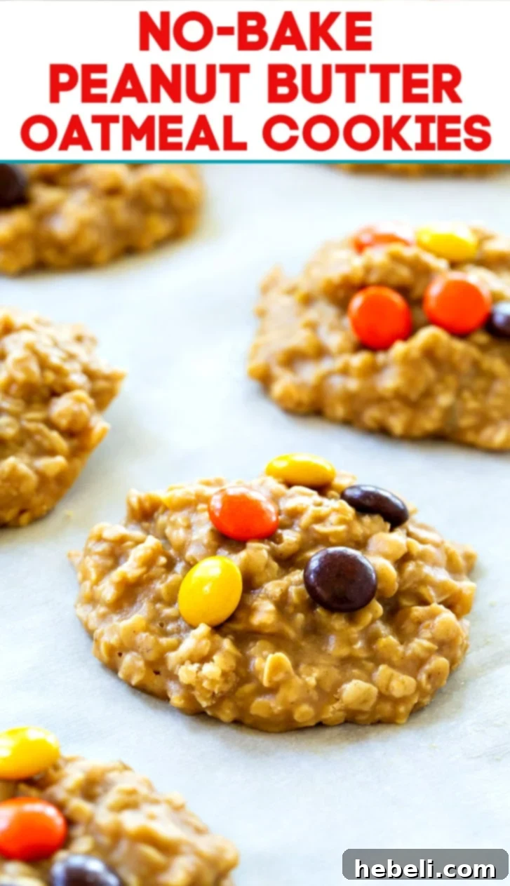 Peanut Butter Oat Energy Bites 6 A large batch of No-Bake Peanut Butter Oatmeal Cookies, perfectly formed and cooling on a surface, inviting a taste.