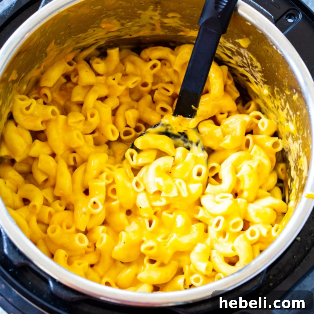 A large bowl of perfectly creamy Instant Pot Mac and Cheese, ready to be served.
