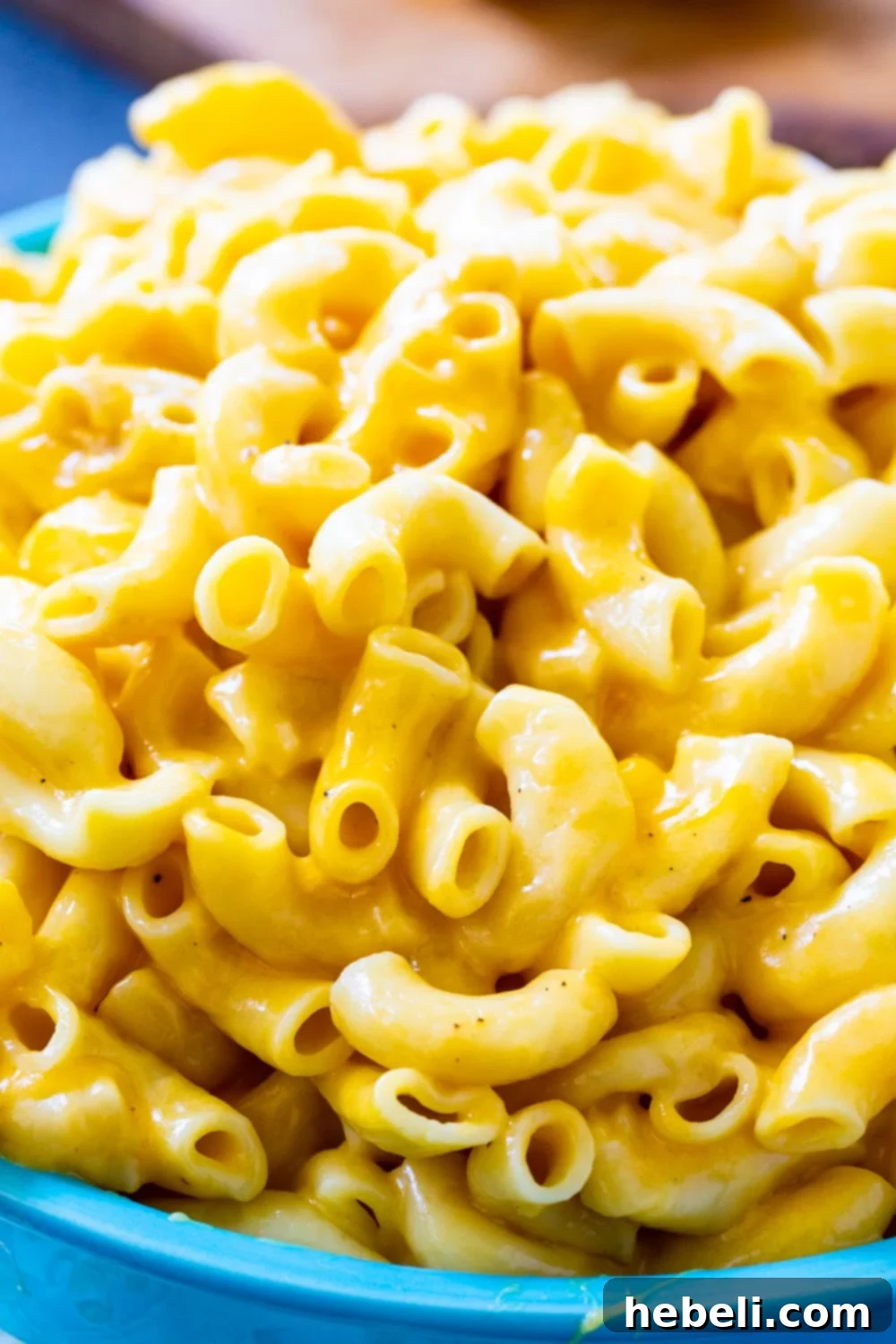 Close-up view of the rich and creamy texture of Instant Pot Mac and Cheese.