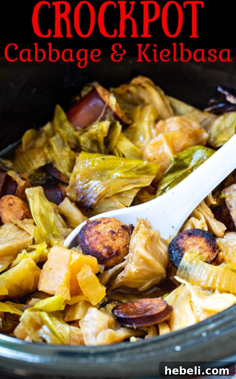Hearty Slow Cooker Cabbage and Kielbasa 6 Close-up of Slow Cooker Cabbage and Kielbasa, garnished with fresh parsley.
