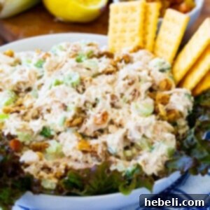 Golden Chicken Salad in a bowl with club crackers, a smaller thumbnail for the recipe card.