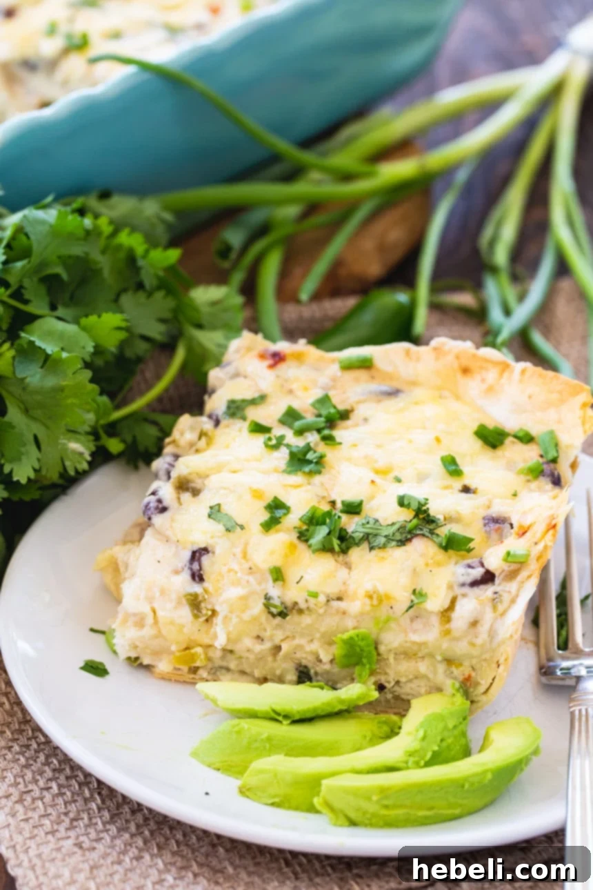 Creamy White Chicken Enchilada Bake 4 White Chicken Enchilada Casserole with fresh sliced avocado and cilantro