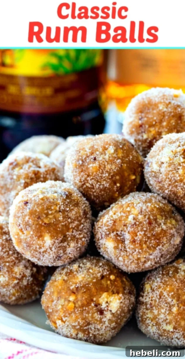 A beautifully arranged stack of Classic Rum Balls, perfect for a holiday dessert table.