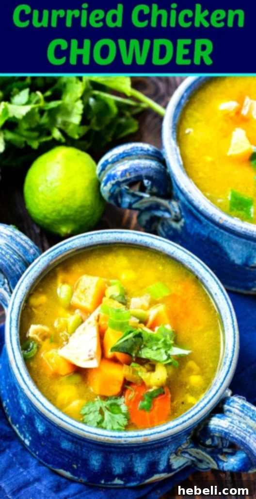 A large serving bowl of Curried Chicken Chowder, garnished and ready to be served family-style