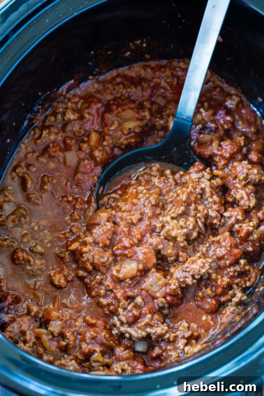 A close-up of slow cooker Sloppy Joes, showcasing the rich, saucy texture.