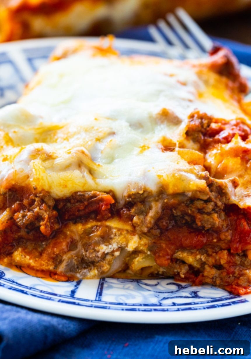 An overhead shot of an unbaked Easy Make-Ahead Lasagna in a baking dish, ready for the oven.