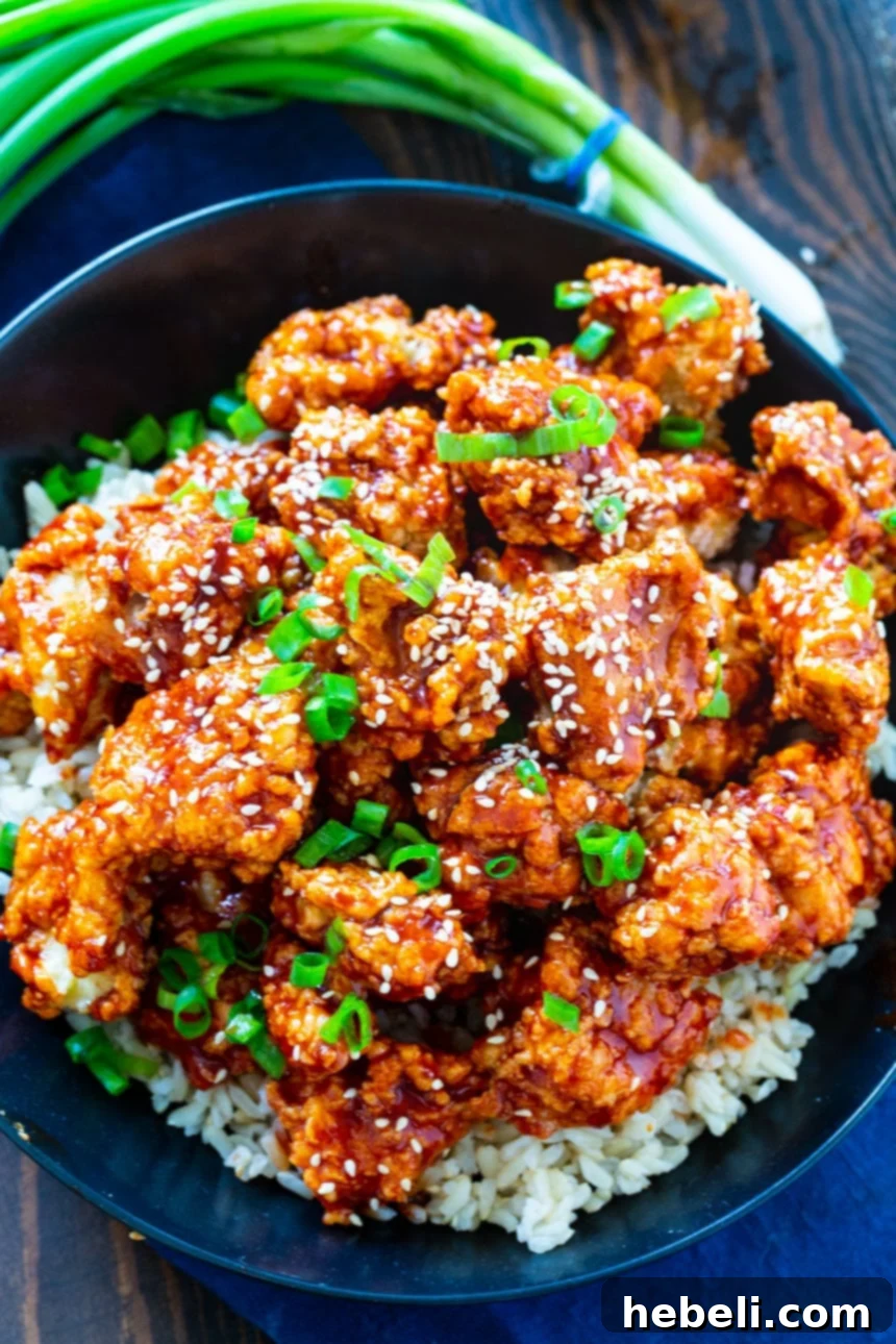 Crispy Korean Fried Chicken 3 Boneless Korean chicken over rice.