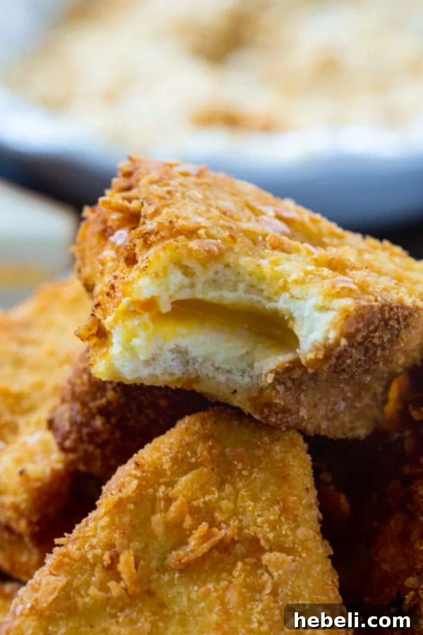 Savory Cheesy French Toast 5 Platter of Midwestern Cheese Frenchies, showcasing their golden-brown color and inviting texture.