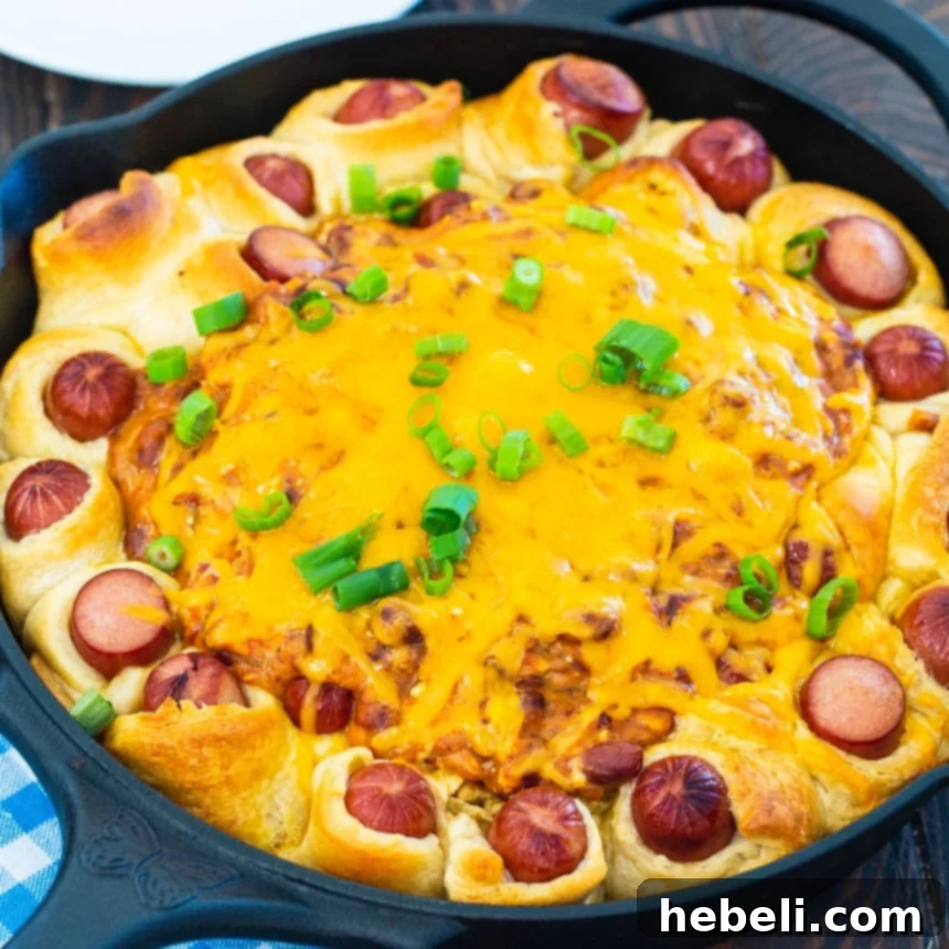 Chili Dog Skillet in cast iron skillet, ready to serve.
