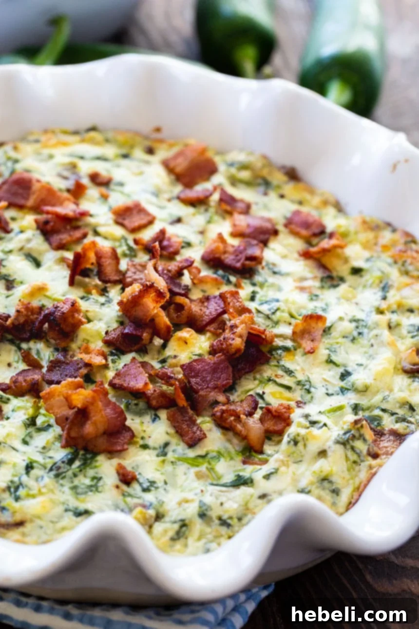Fiery Jalapeno Bacon Spinach Dip 3 Close-up shot of the creamy hot jalapeño spinach bacon dip, showcasing its texture and ingredients.