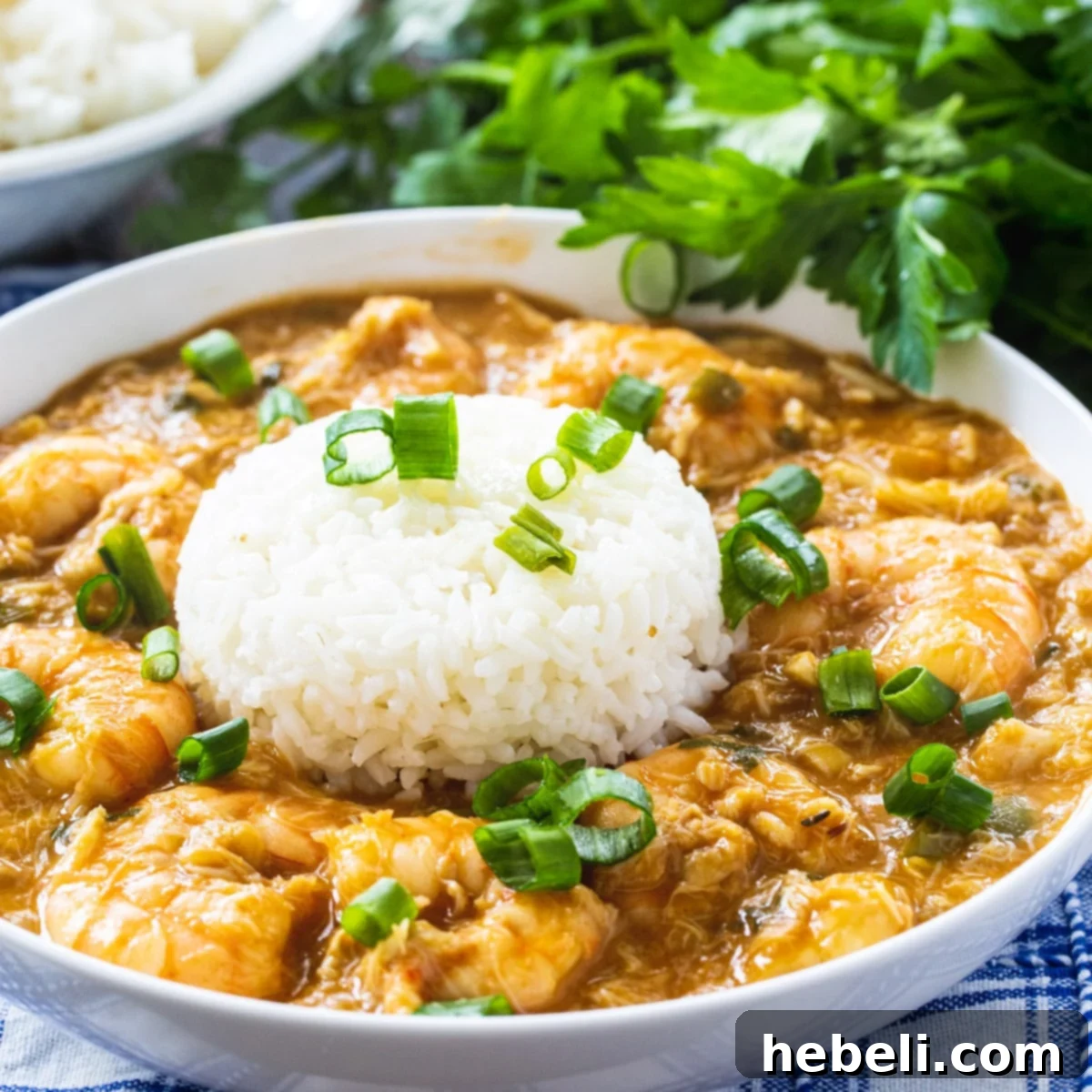 Louisiana Crab and Shrimp Etouffee 2 Crab and Shrimp Etouffee - A rich, spicy Louisiana seafood stew.