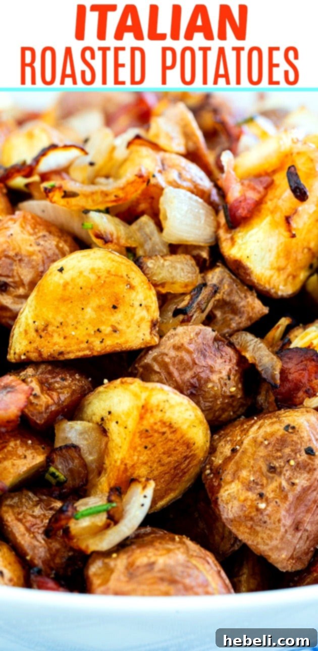 Close-up of golden brown Italian Roasted Potatoes with fresh rosemary sprigs, ready to be served.