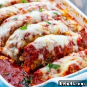 Italian Meatloaf cooked in tomato sauce.