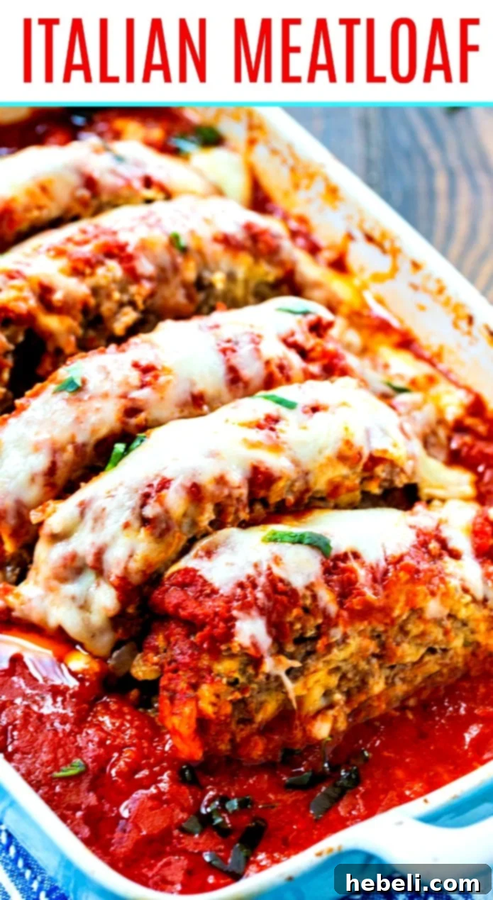 Large slice of Italian Meatloaf cooked in tomato sauce with melted fontina cheese.