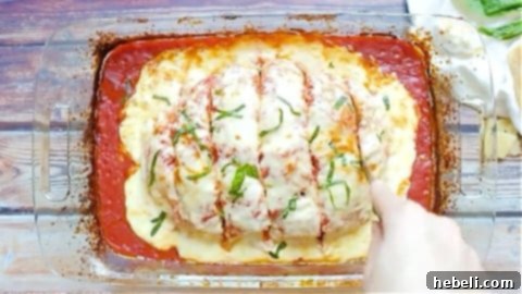 Slicing the perfectly cooked Italian Meatloaf.