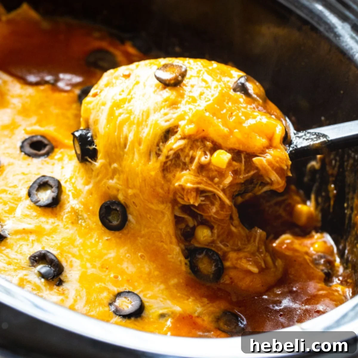 Easy Slow Cooker Chicken Enchilada Casserole 2 Slow Cooker Chicken Enchilada Casserole – A simple, cheesy, and delicious meal perfect for any night.