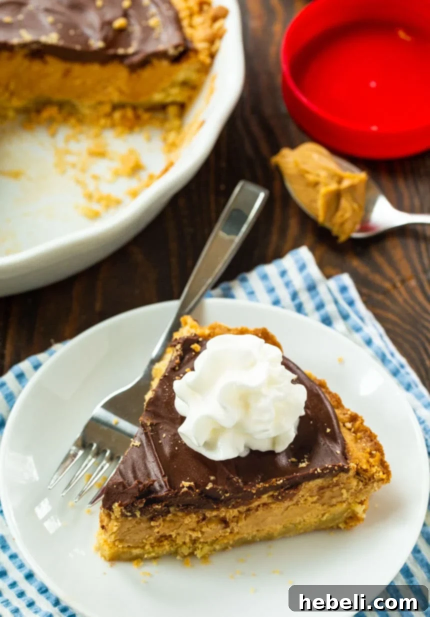 Ultimate Chocolate Peanut Butter Cookie Pie 4 Full Chocolate Topped Peanut Butter Pie with Sugar Cookie Crust on a serving platter