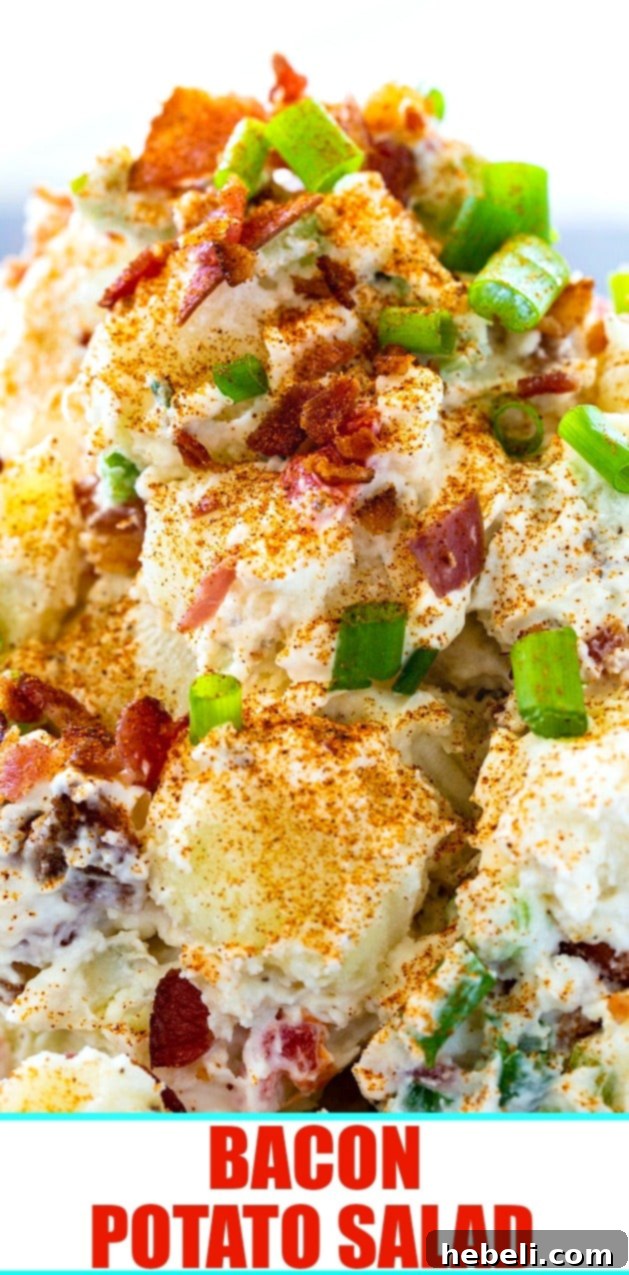 Loaded Bacon Potato Salad 6 Extreme close-up view of creamy potato salad with visible bacon bits, celery, and green onions, inviting to taste.