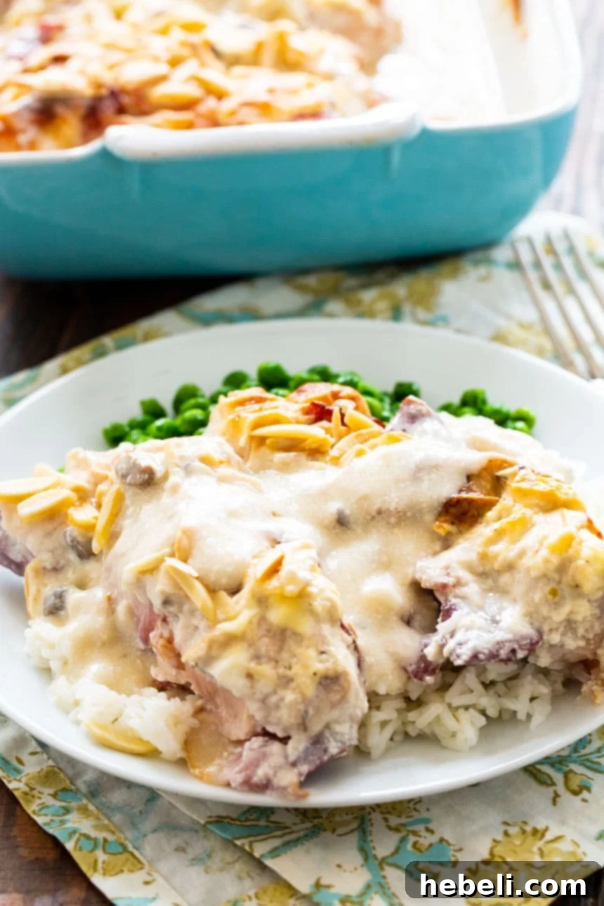 Creamy Company Chicken Bake 7 A close-up of the Chicken and Sour Cream Bake with Chipped Beef, showing the creamy sauce, bacon, almonds, and tender chicken, ready to be served.