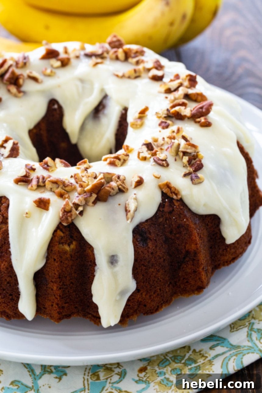 Southern Hummingbird Bundt 3 Beautifully glazed Hummingbird Bundt Cake, ready to be served, highlighting its intricate bundt shape.