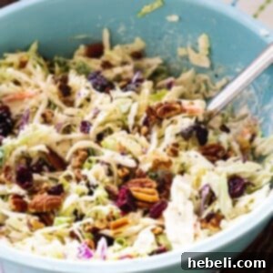 Cranberry Pecan Coleslaw in large blue bowl.