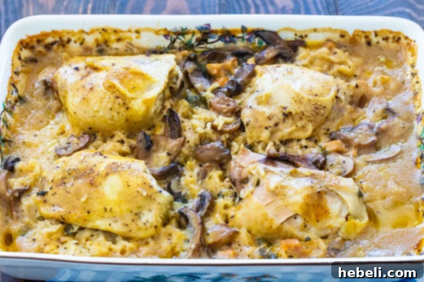 Savory Bacon Chicken Rice Bake 5 A delicious serving of Baked Chicken and Rice with Bacon on a plate, showcasing its creamy texture and tender chicken.