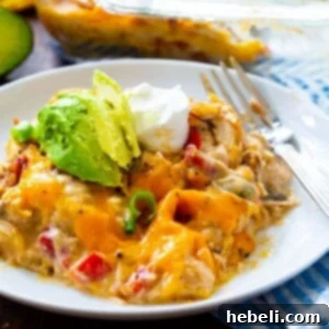 King Ranch Chicken Casserole topped with avocado, a close up of a serving