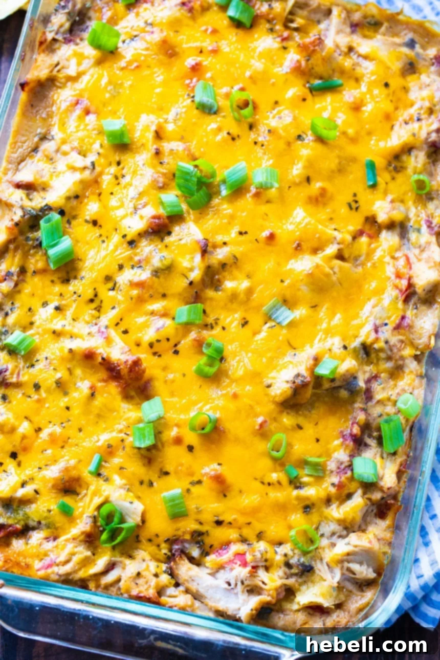 Hearty King Ranch Chicken Casserole 3 Rich and creamy King Ranch Chicken Casserole in a ceramic baking dish, ready to be served.