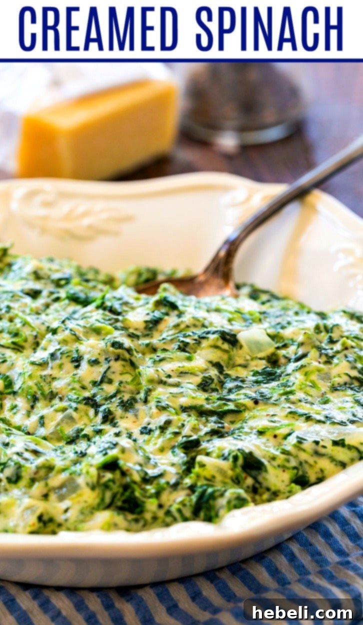 Velvety Creamed Spinach 6 Creamed Spinach in a white serving bowl, garnished and ready to serve.
