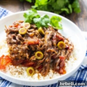 Ropa Vieja served over white rice.