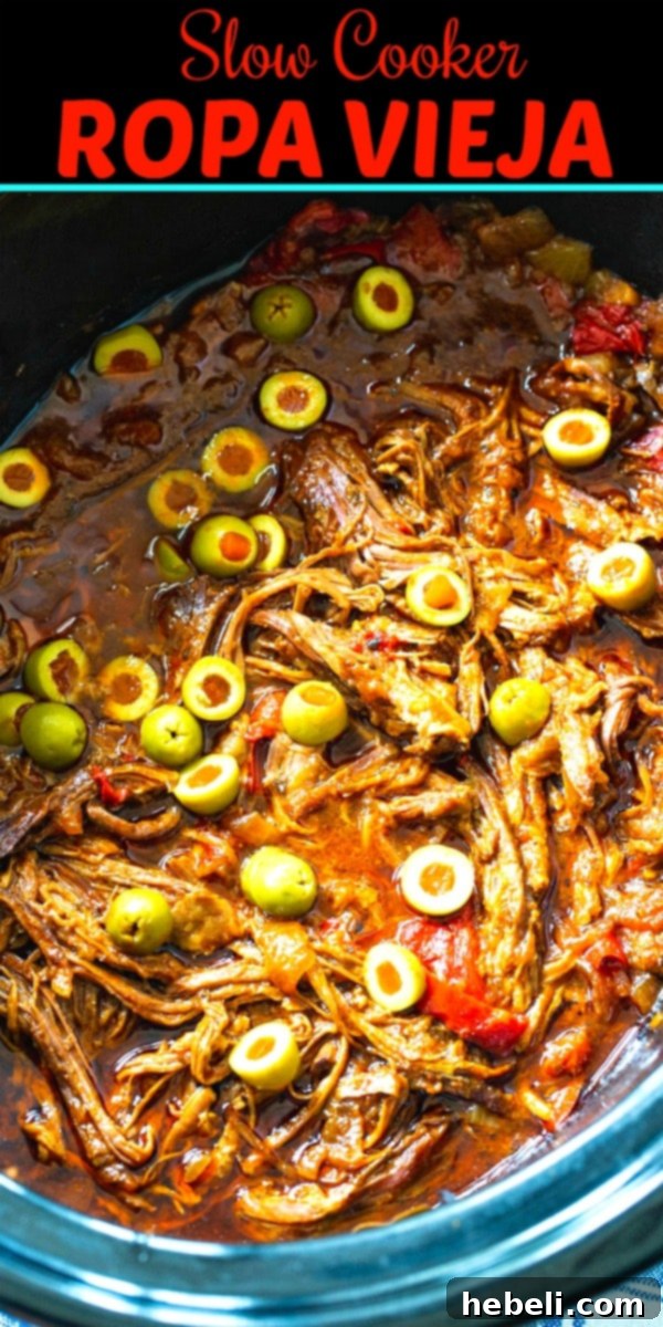 Large bowl of shredded Ropa Vieja from the slow cooker, ready to be served.