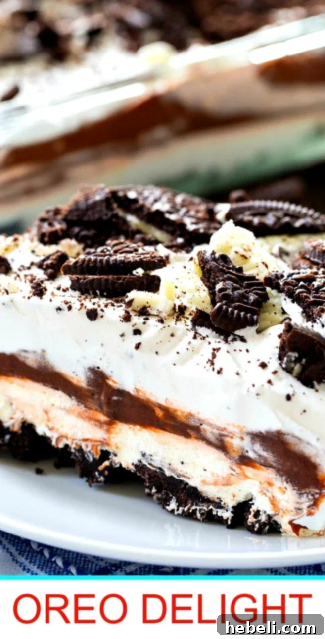 Close-up of a rich and creamy slice of Oreo Delight, showing its decadent layers.