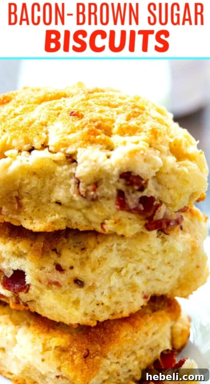 Close-up view of a single Brown Sugar Bacon Biscuit, showing the golden brown exterior, visible bacon pieces, and shiny glaze.