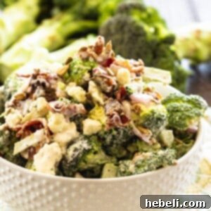 Broccoli Salad with Bacon and Blue Cheese in a white bowl.