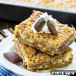 Two Toffee Bars stacked on a plate, ready to be enjoyed.