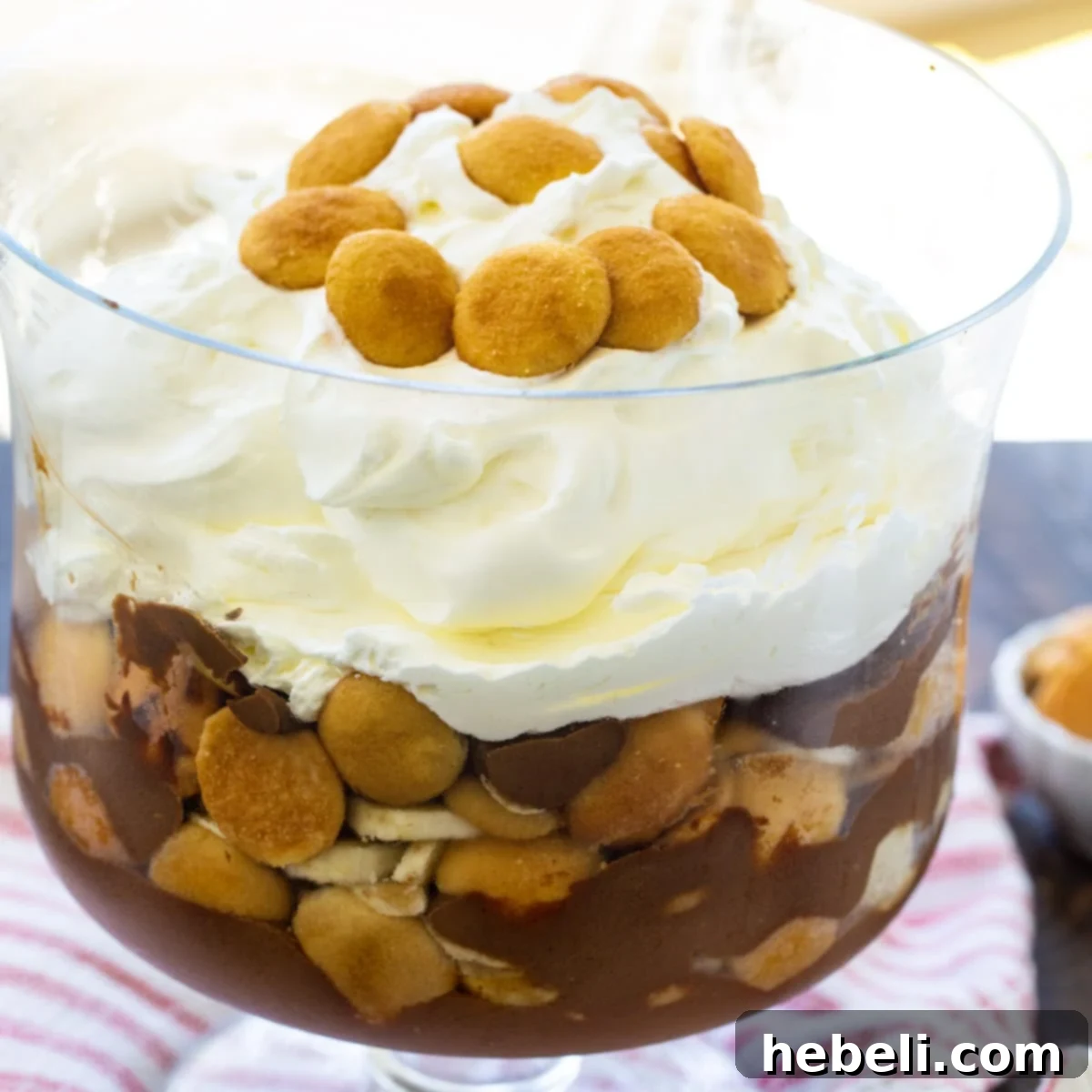 Chocolate Banana Pudding in a trifle bowl, showcasing its beautiful layers.