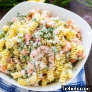 Shrimp and Dill Pasta Salad in a white serving bowl, ready to be enjoyed.