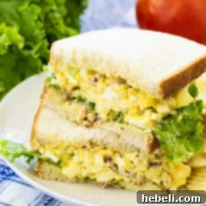A delicious Bacon Egg Salad sandwich with fresh ingredients.