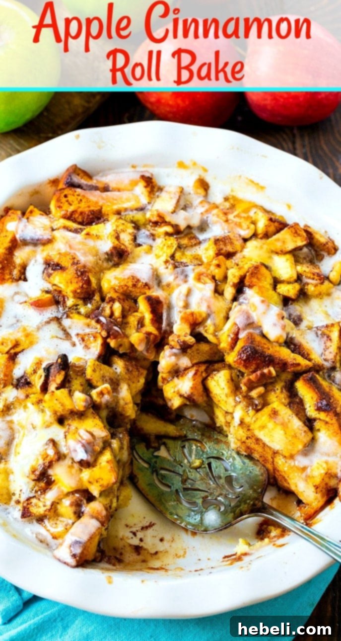 A slice of Apple Cinnamon Roll Bake, showing the tender cinnamon rolls, soft apples, and melted icing.