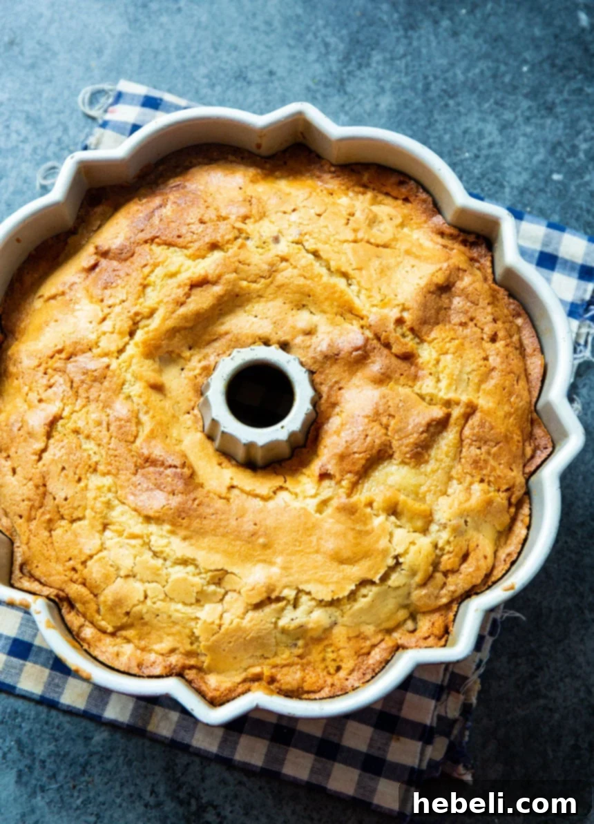 Southern Pecan Praline Bundt Delight 3 Southern Praline Bundt Cake cooling in a decorative bundt pan.