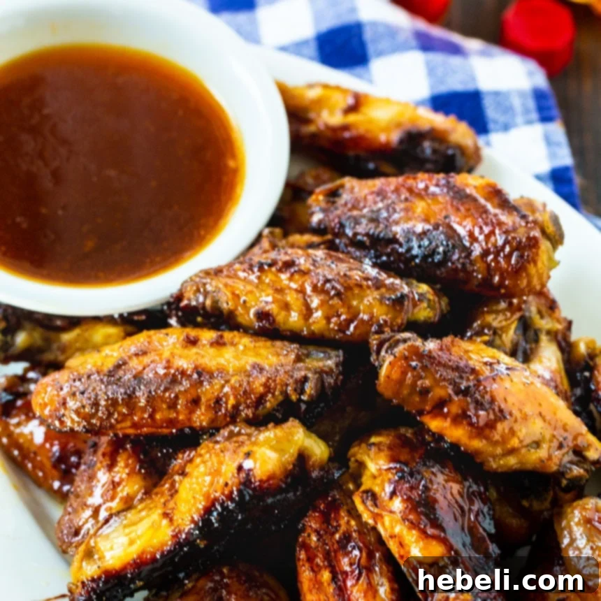 A vibrant platter of Honey TABASCO Wings, glistening with sweet and spicy glaze, ready to be enjoyed.