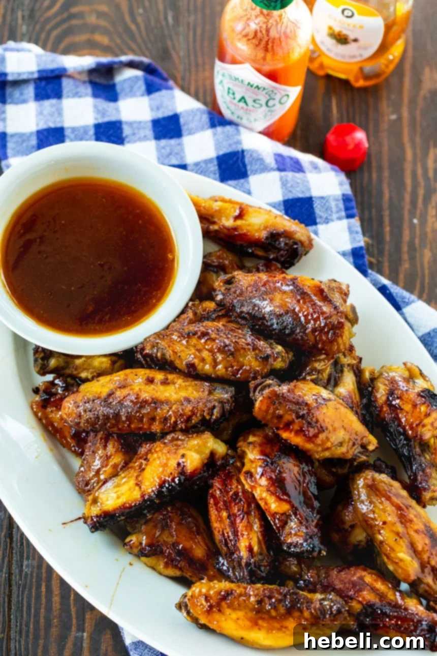 An appetizing overhead view of Honey TABASCO Wings arranged on a serving platter, inviting guests to dig in.
