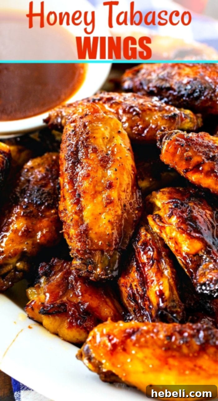 A beautifully presented serving of baked Honey TABASCO Wings, ready for a feast.