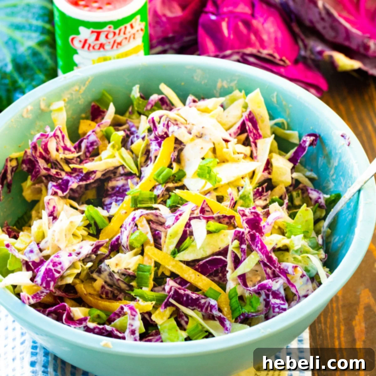 Zesty Creole Coleslaw 2 Large bowl full of Creamy Creole Colelsaw, garnished with green onions.